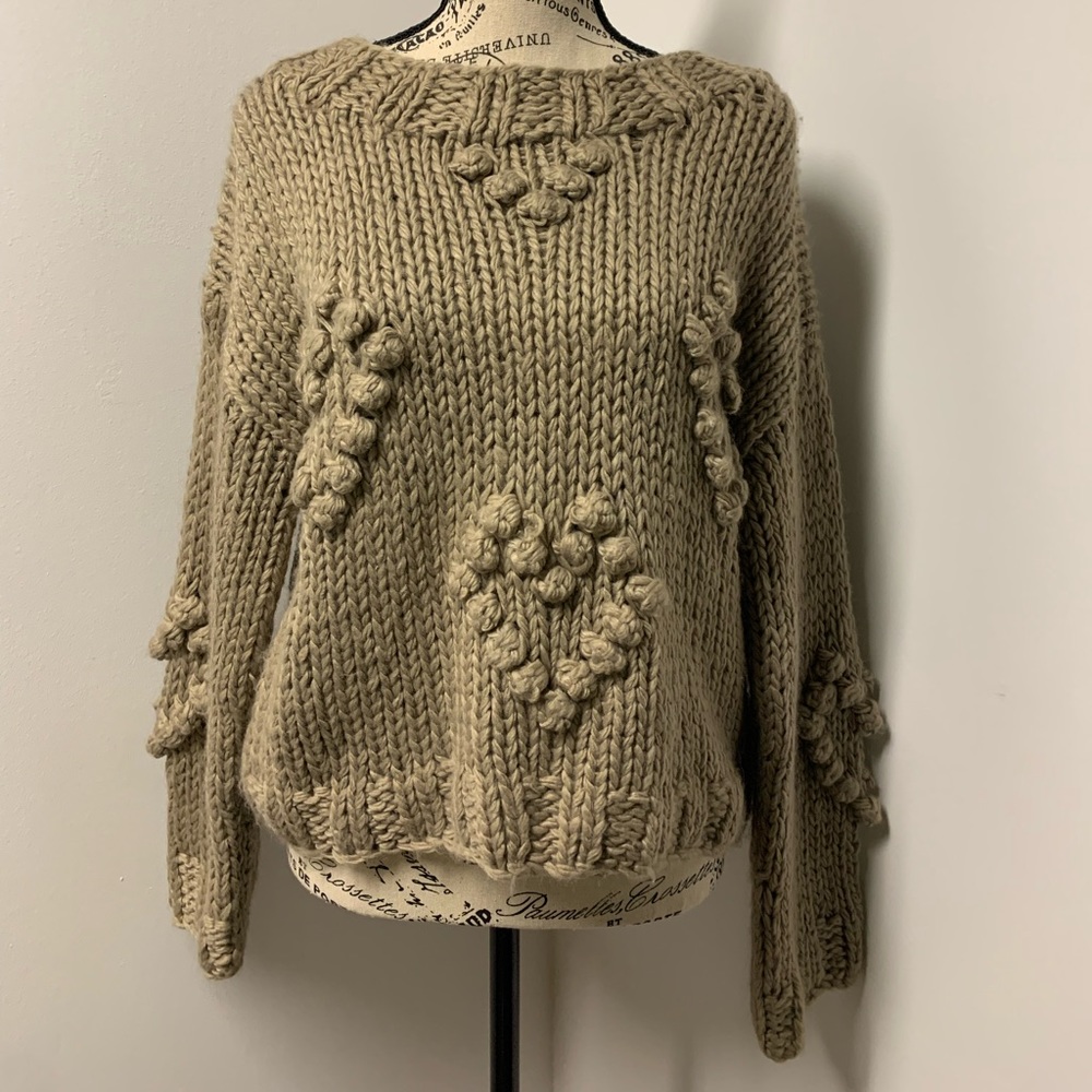 Knitted, patterned sweater